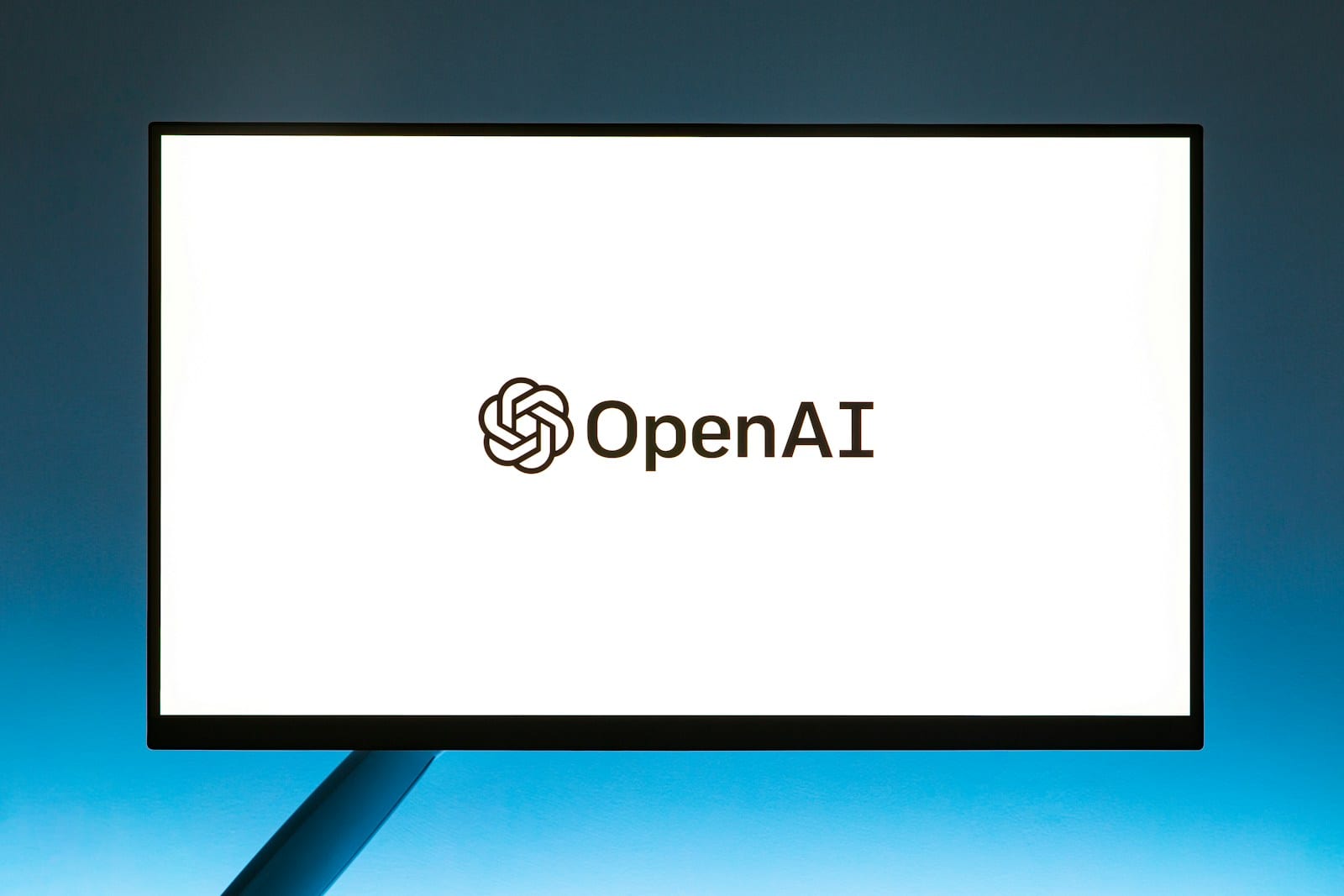 OpenAI logo displayed on a computer monitor, representing the rise of AI search tools like ChatGPT